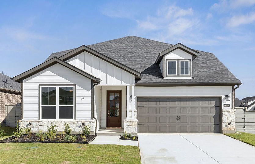 The Keller, a two-story home with 2-car garage, shown with Home Exterior 38