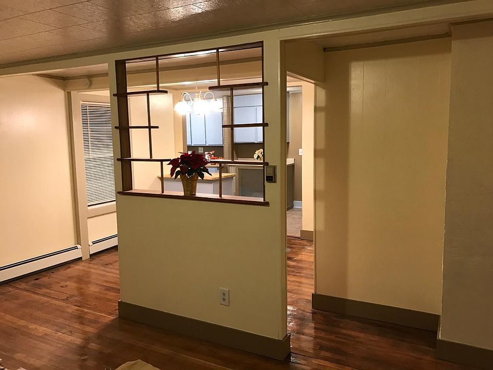 Spacious living room, looking into Dining room & Kitchen