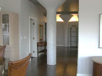 Hardwood flooring is found throughout the condo.
