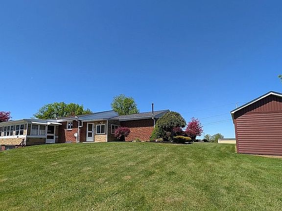 Exterior - Rear Left + Shed