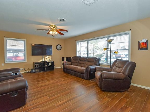 As soon as you walk in you are greeted with a spacious living room for all your entertainment needs. Plenty of natural light. Let's not forget the new wood looking tile.