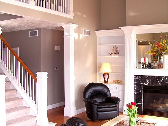 Two story great room with gas fireplace.