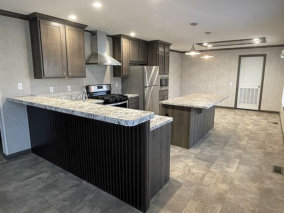 2nd image of 7204 E Grand River Ave #381