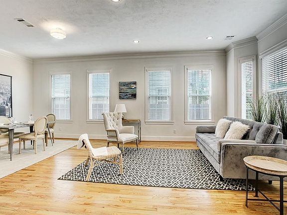 Dining room and living room surrounded by tons of natural light!