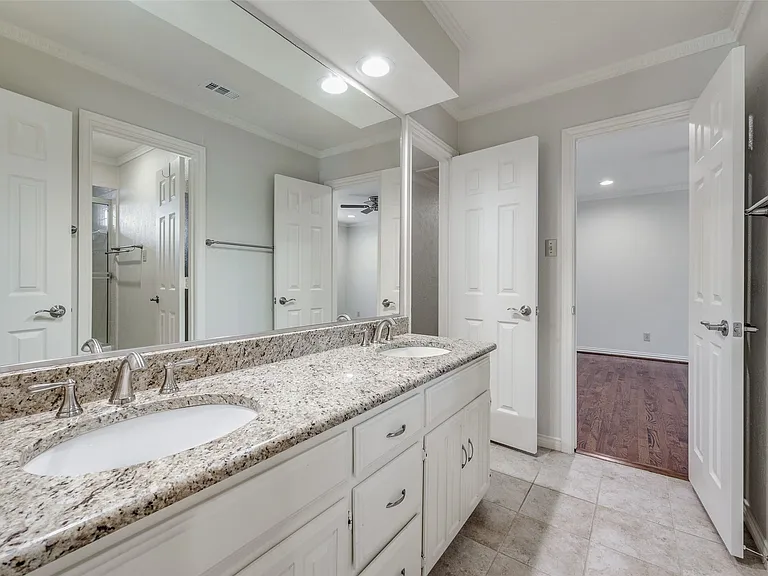 Jack-and-jill bath area connecting the two secondary bedrooms
