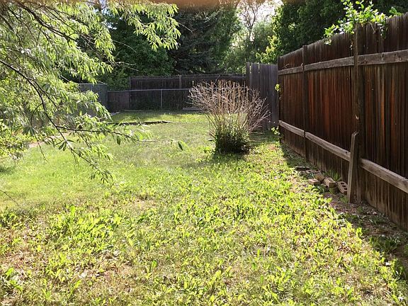 Fenced Back Yard with Garden Area