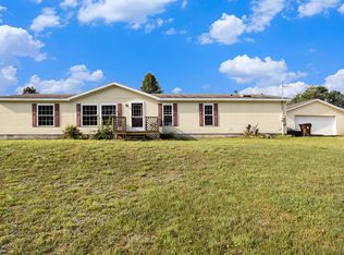 6435 W Almy Rd, Six Lakes, MI 48886