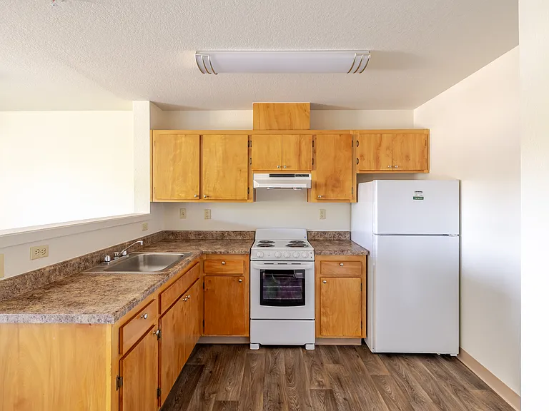 Bright, functional kitchen with full-size appliances and ample storage.