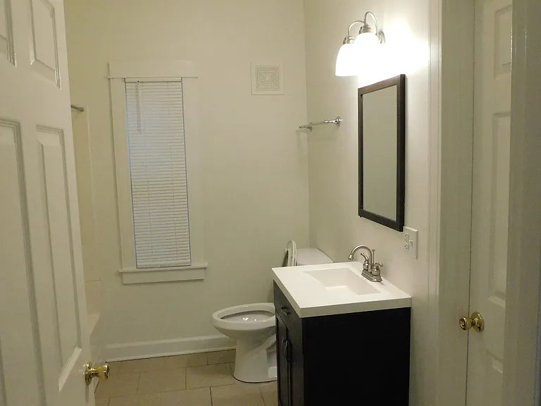 New vanity being installed in 2nd bathroom. Includes tub with shower.