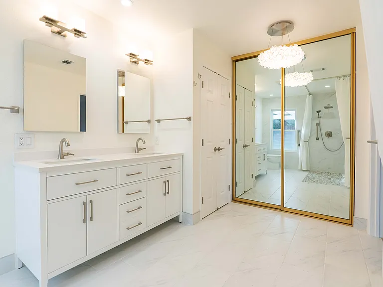 Master bathroom with 2 closets.