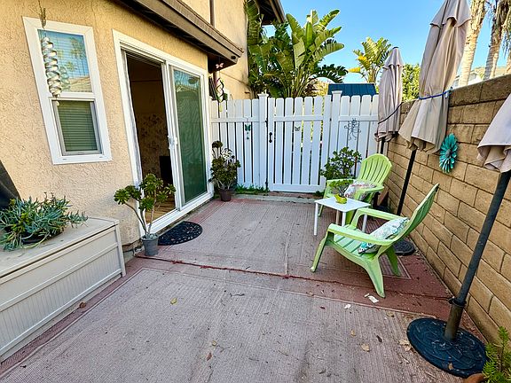 Private entrance with patio area. Sliding door is locking with keys.