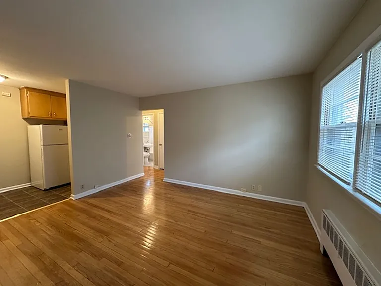 Cozy 1BR in Riverwest $925 Heat Included | Hardwood Floors | Storage + Laundry — Photo 2