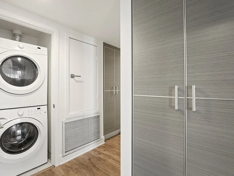 In-Suite Full-Size Washer & Dryer and Large Size Cabinet Storage