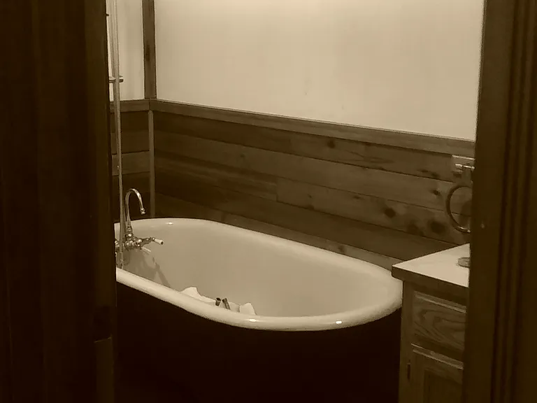 Refinished Clawfoot Bathtub in Bathroom -- Includes Full-Surround Shower Rod