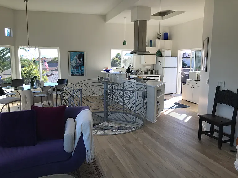 Look from the living room to the kitchen