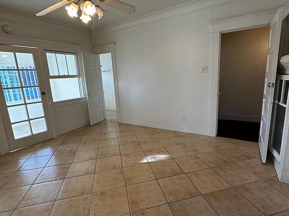Room #2 with access to the front stairwell(Right) , Large closet (left door). On the very left side door is where room #3.