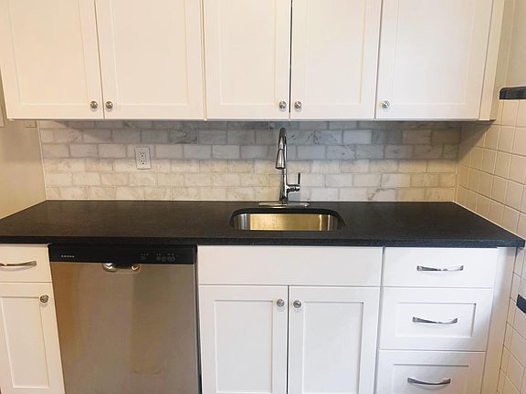 New kitchen cabinets, countertop, flooring, dishwasher and refrigerator 2023