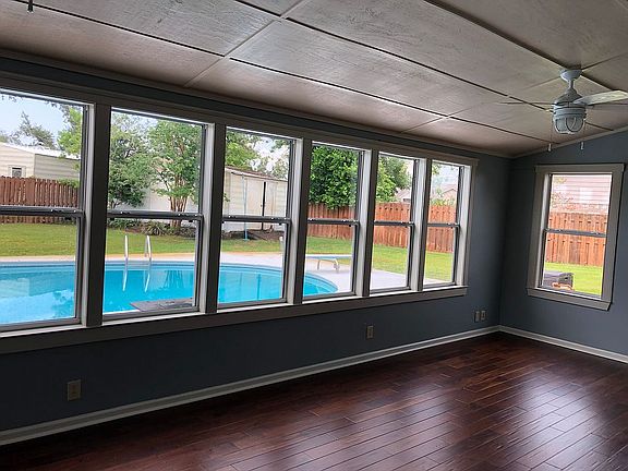 Florida Room overlooks pool.