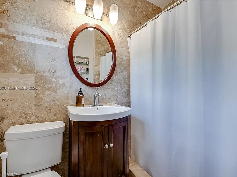 4477 SW 15th Ter #1 — Photo 6