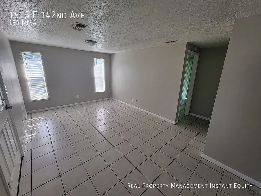 Building Photo - 1513 E 142nd Ave