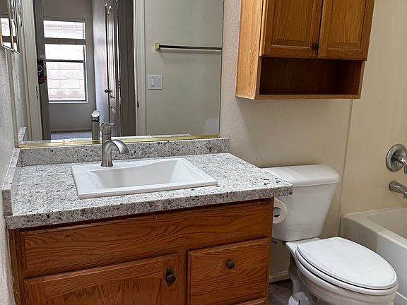 hall Guest bath. Updated flooring, granite and fixtures