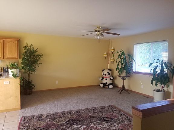Living room; the living room in the unit is vanilla not gold