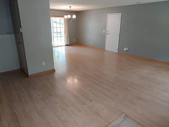 From front door to L-shaped dining room (main level)