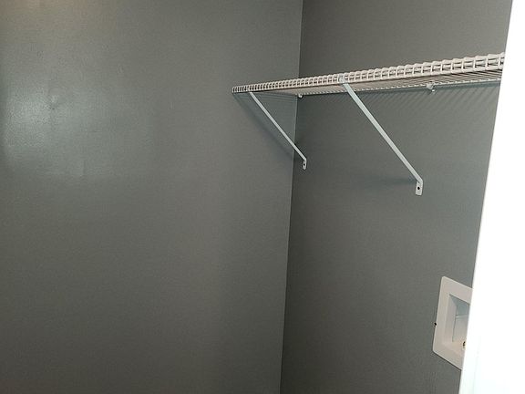 Laundry room space with washer/dryer hookups