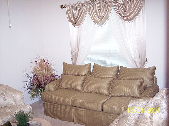 Beautiful formal living or study with french doors.