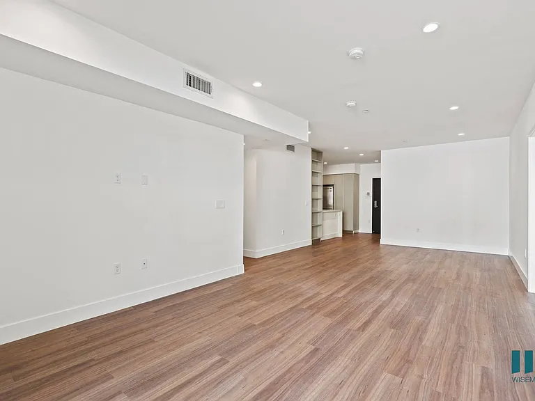 Dining and Living Room with Recessed Lighting and Vinyl Flooring