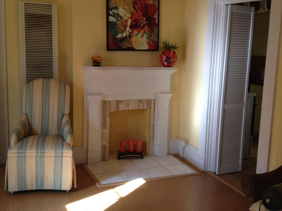 Charming fireplace in the living room. Not usable