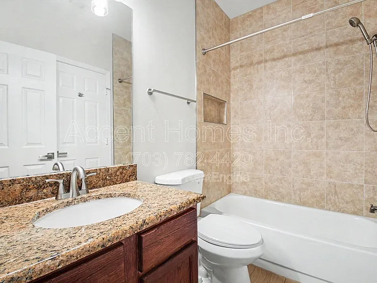 14309 Climbing Rose Way #104 — Photo 11