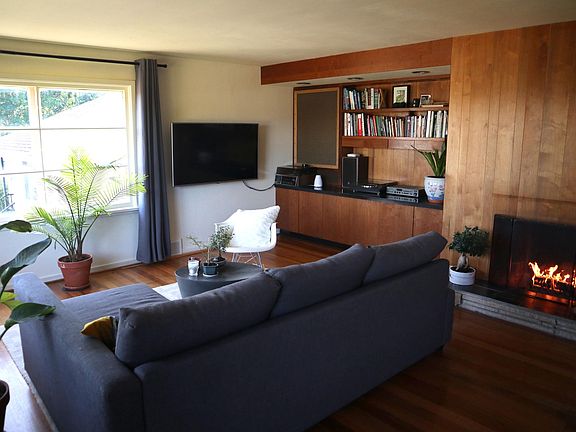 Living room showing old window. Was just enlarged. See other photo.