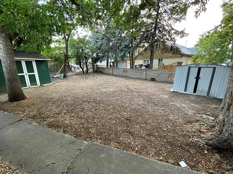 Large backyard and a shed for extra storage.