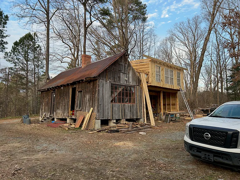 1920's homestead being repaired after tree damage