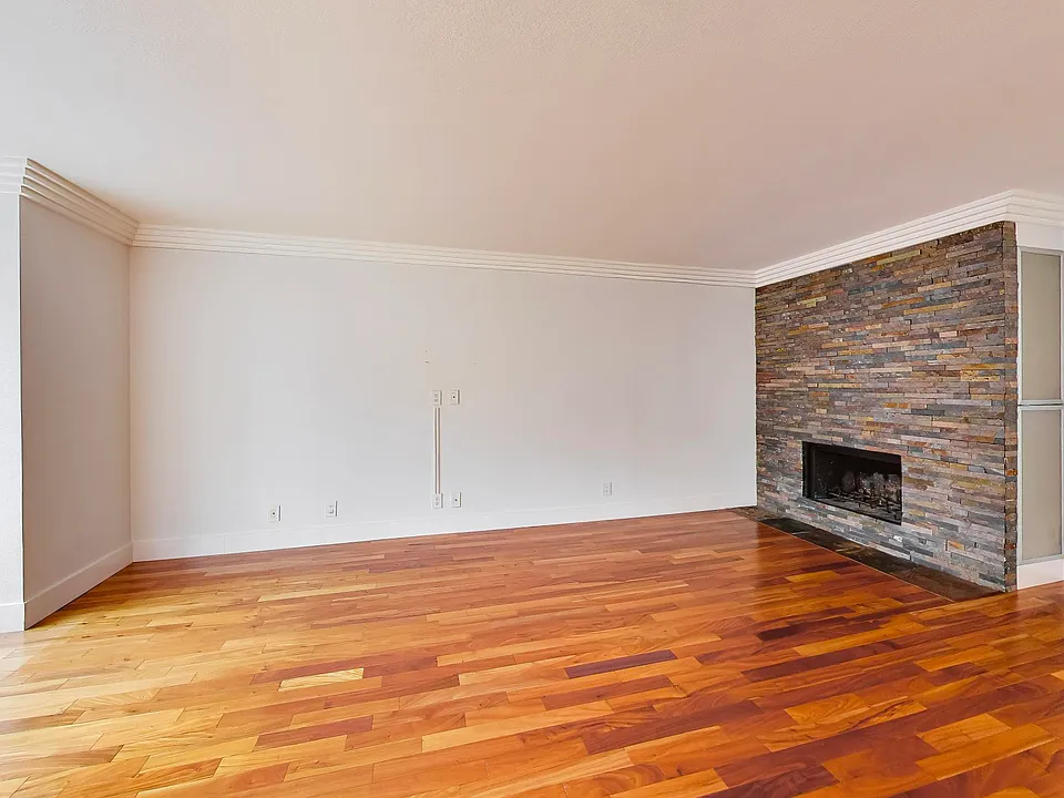 Fireplace, storage cabinets on the right