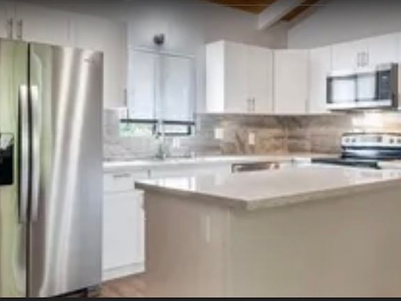 2nd image of 76-6127 Royal Poinciana Pl