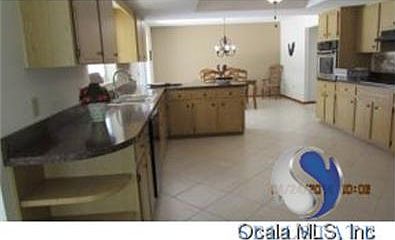 5th image of 212 Marion Oaks Golf Way