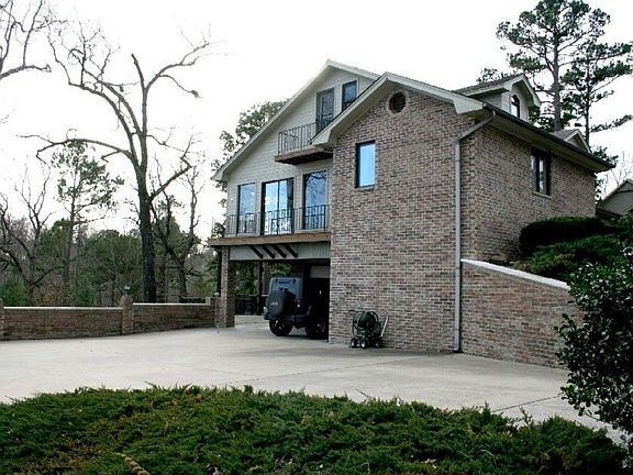 3 car garage and 2 car covered parking