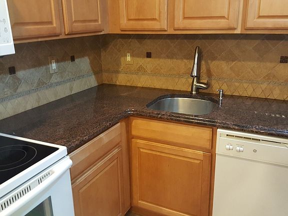Beautiful Granite and Custom Backsplash