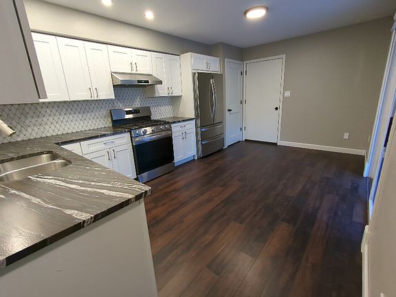 Entry from hall into kitchen.