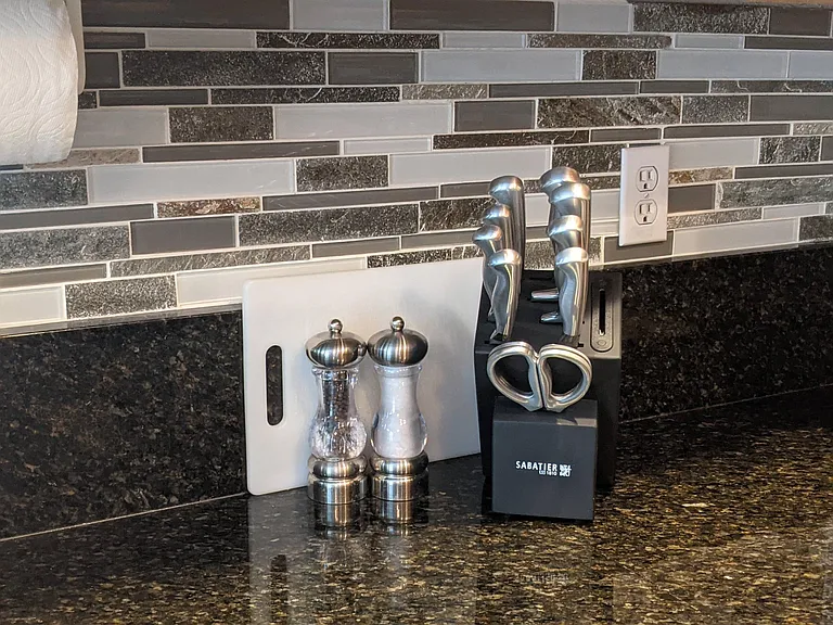 Kitchen Inventory, Granite counters and sleek backsplash