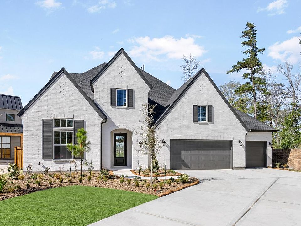 Classic white brick exterior with dark trim