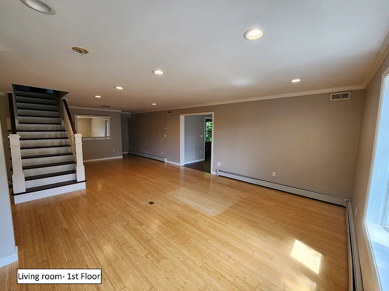 View from entryway into oversized living room