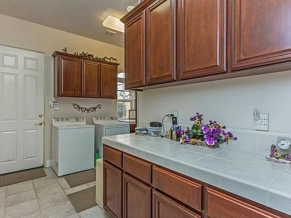 5th image of 4571 N Outlook Ct