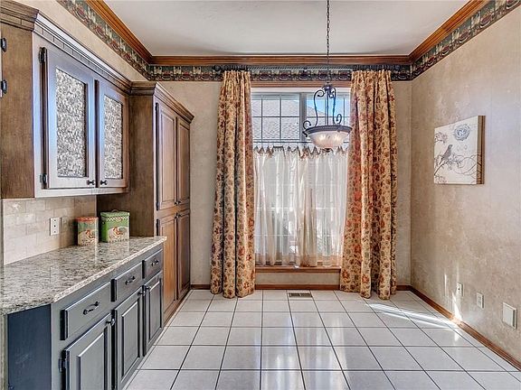 Another view of the eat-in area.  It has a lovely window with lots of light.