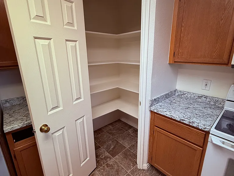 Corner of kitchen showing pantry