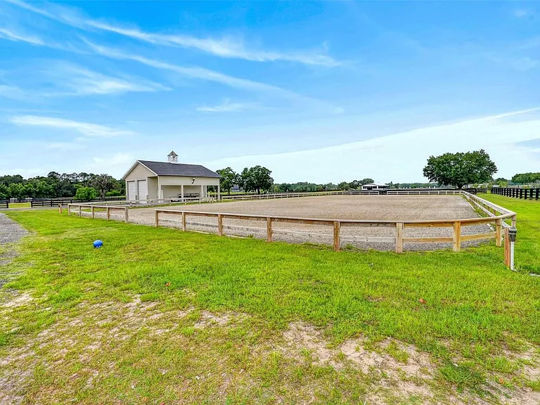 11257 NW 50th Ln — Photo 75