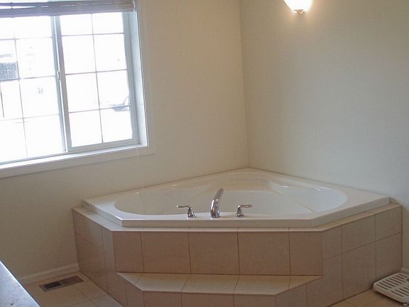corner soaking tub in master bath
