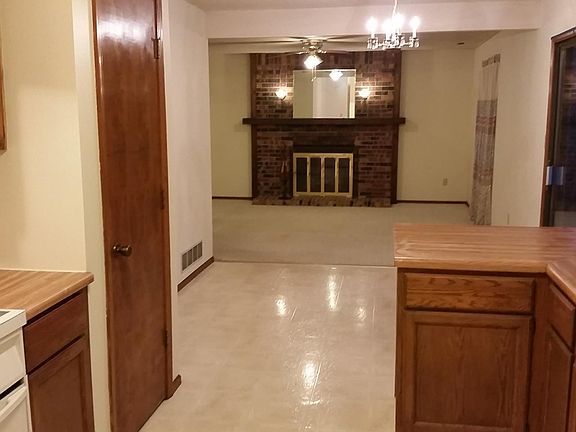 View from kitchen, through dining room, into living room.